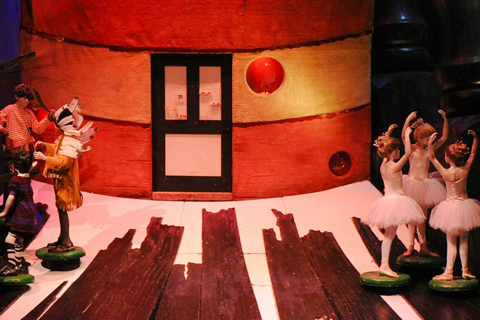 Theatrical scene from Hansel and Gretel performance in Sydney with dancers and set.