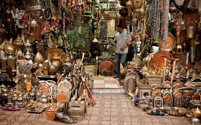 Fes Old Medina market stall with traditional Moroccan crafts and antiques.