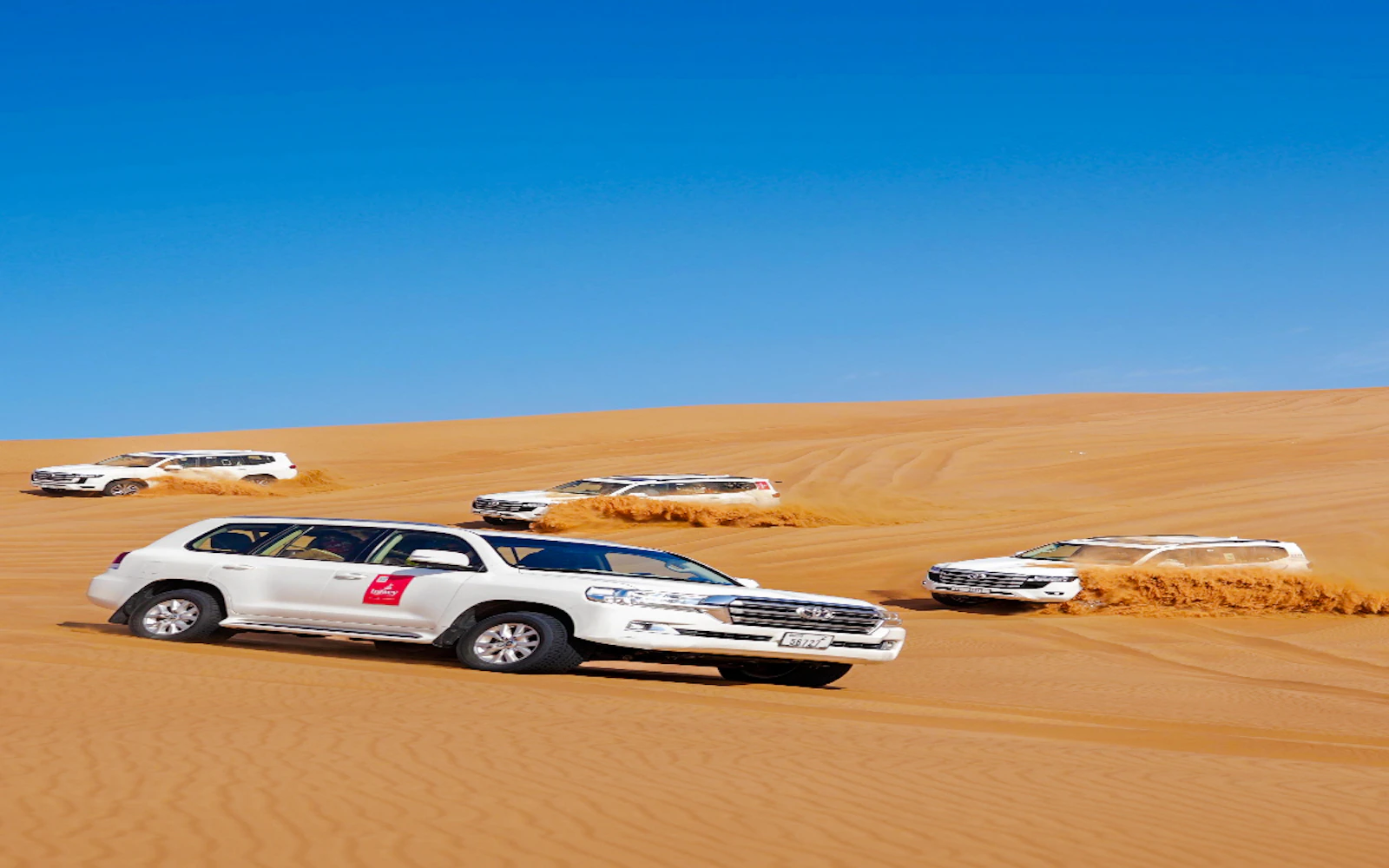 Dubai Lahbab Red Dunes Desert Safari with Dune Bashing, Camel Ride & BBQ Dinner at Heritage Camp Image 10