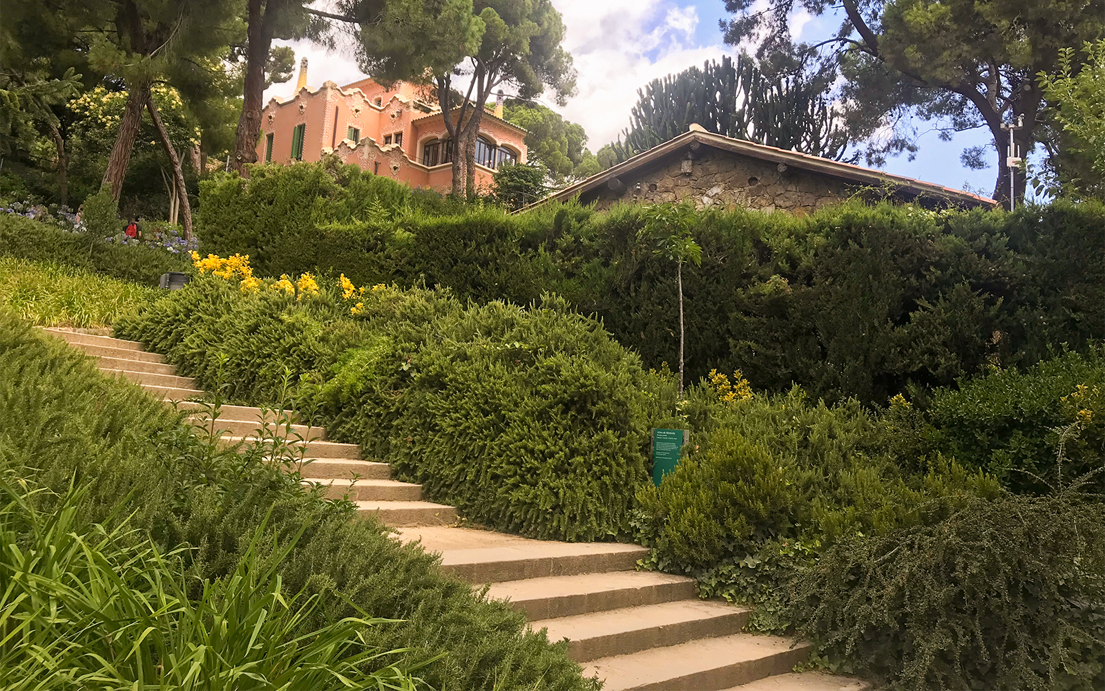 Colorful mosaic structures in Park Güell, Barcelona, showcasing Gaudí's architectural style.