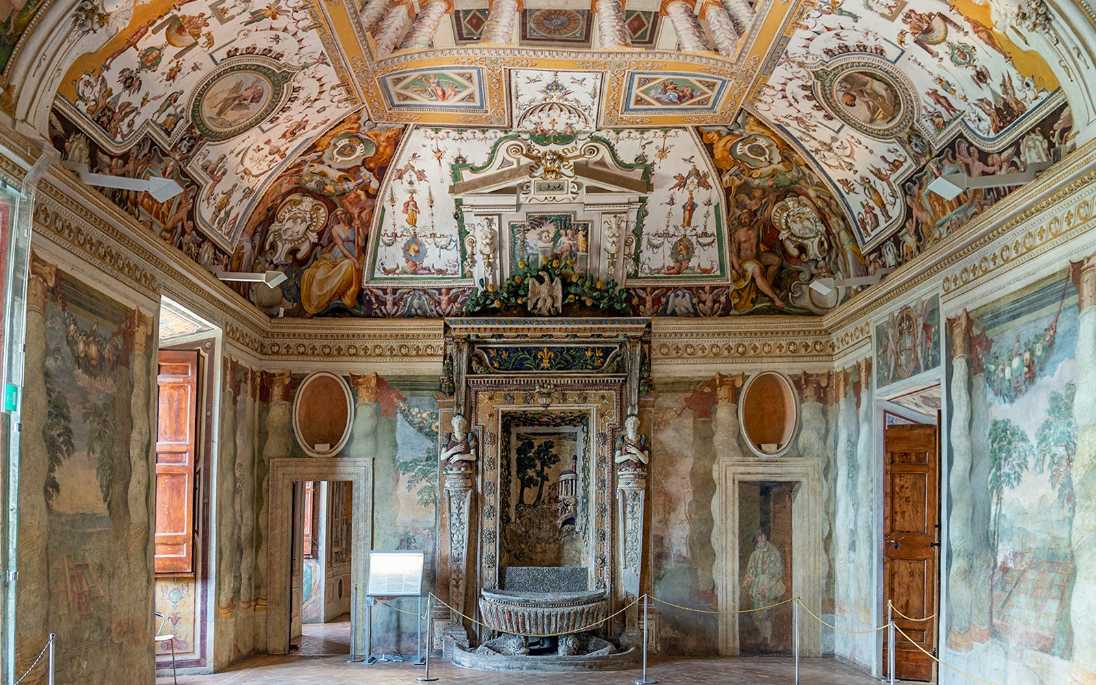 Salon of the Fountain at Villa d'Este, featuring ornate frescoes and intricate architectural details.