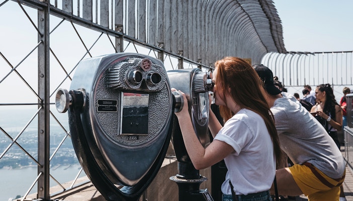 tourists enjoying at Outdoor observation deck at 86th floor of empire state building