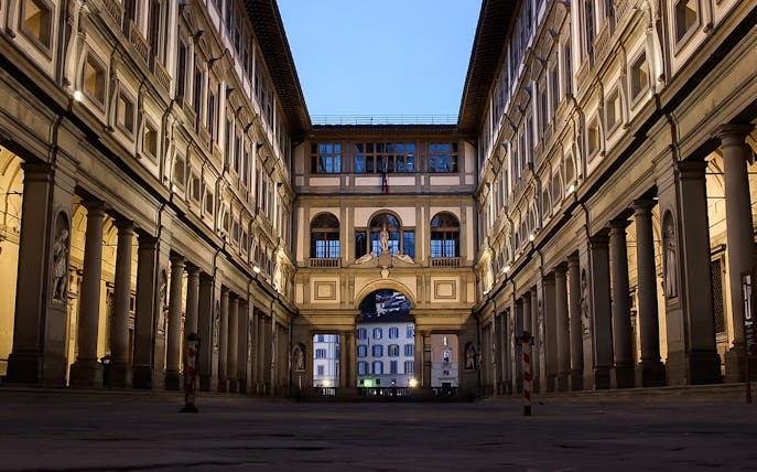Uffizi Gallery courtyard in Florence, Italy, showcasing Renaissance architecture.