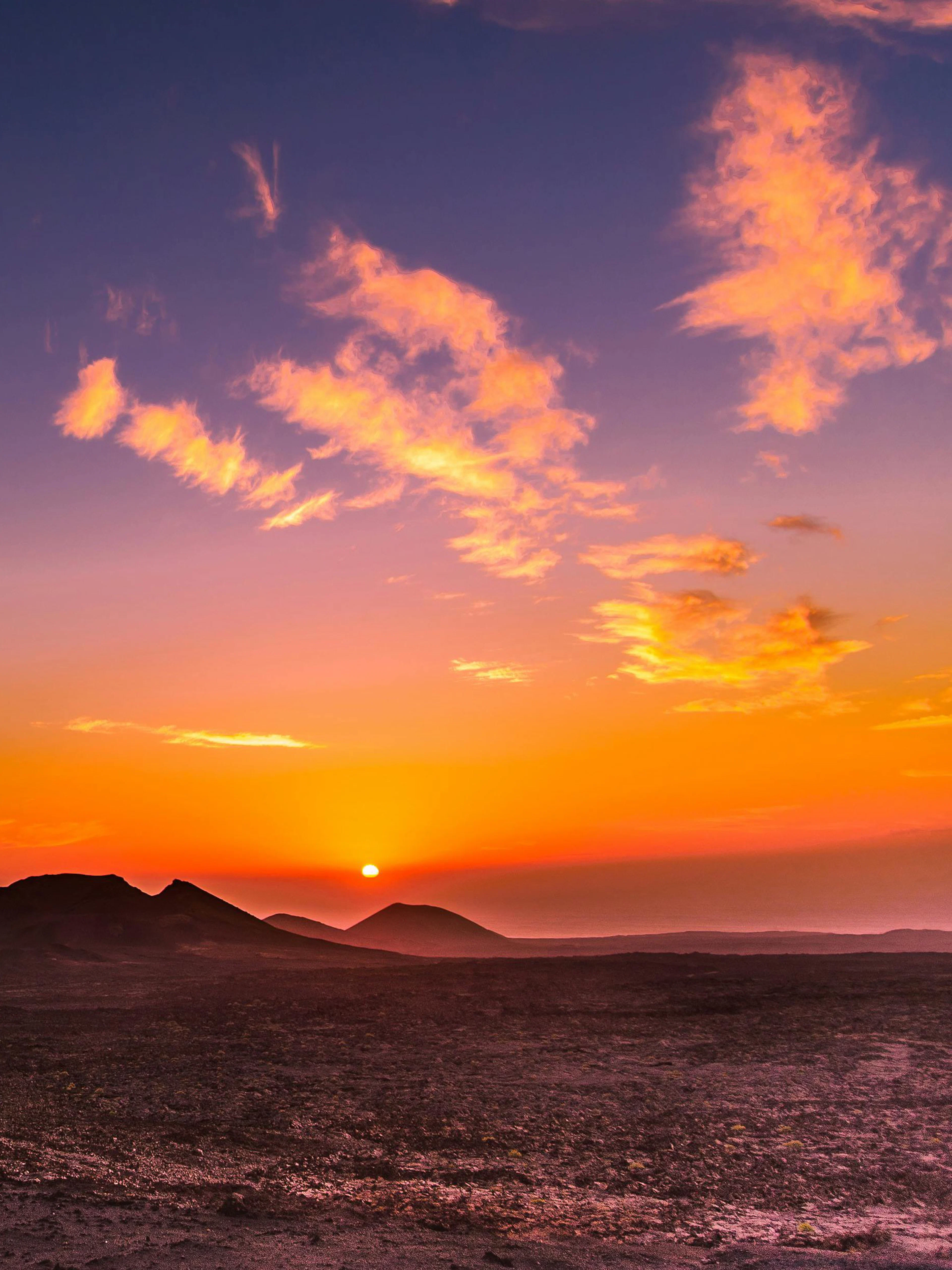 Sunset over volcanic landscape at Timanfaya National Park, Lanzarote.