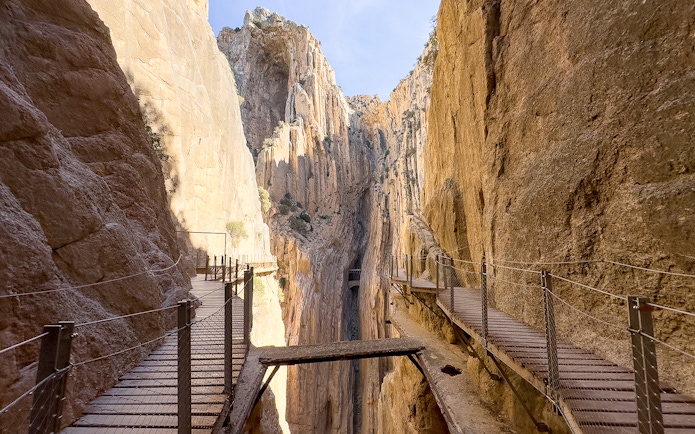 Caminito del Rey walkway between steep cliffs in Andalusia, Spain.