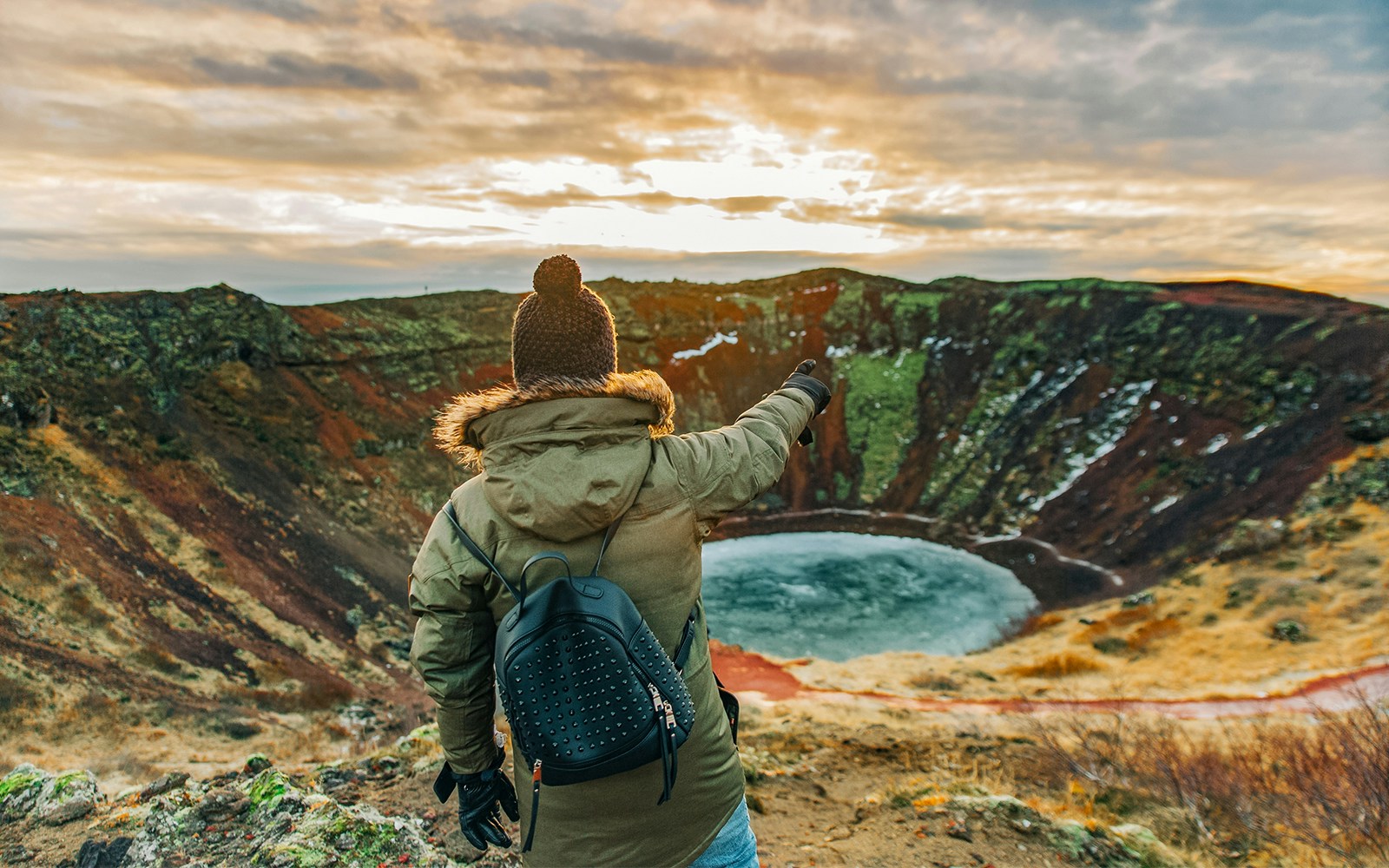 Why visit the Geysir geothermal area?