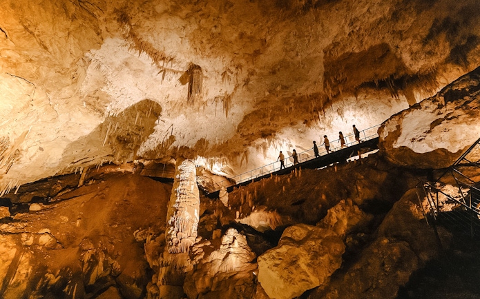 Visitors exploring Jewel Cave in Margaret River on a guided tour.