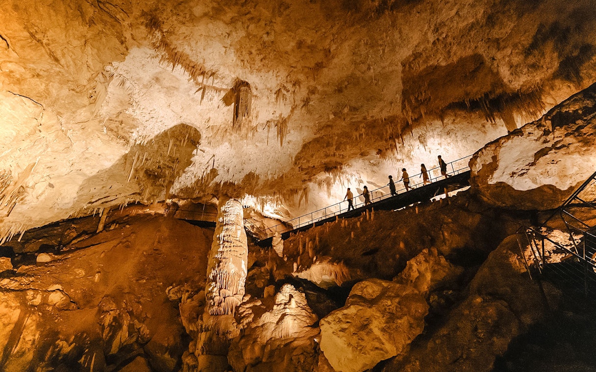 Visitors exploring Jewel Cave in Margaret River on a guided tour.