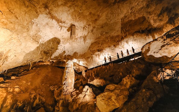 Visitors exploring Jewel Cave in Margaret River on a guided tour.