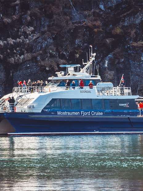 People enjoying the Mostraumen Fjord Cruise in Norway.