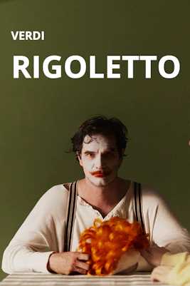 Performer in clown makeup holding a wig, promoting Verdi's Rigoletto.