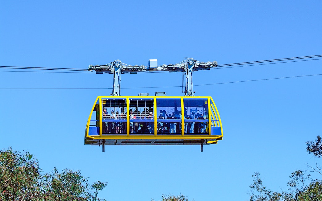 Skyway cable car at Scenic World, Blue Mountains, with passengers enjoying the view.