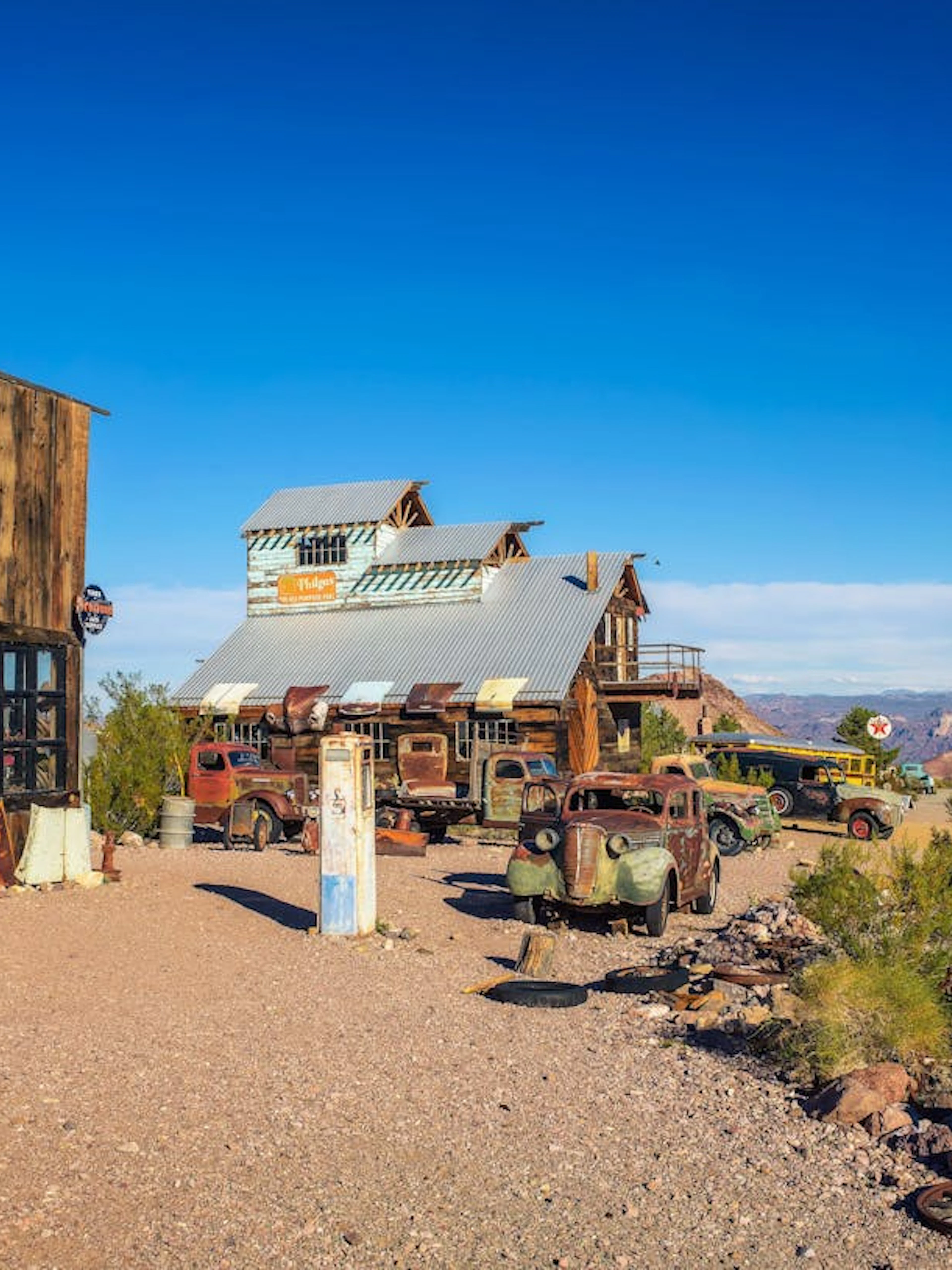 El Dorado Canyon Ghost Town with vintage cars and rustic buildings near Las Vegas.