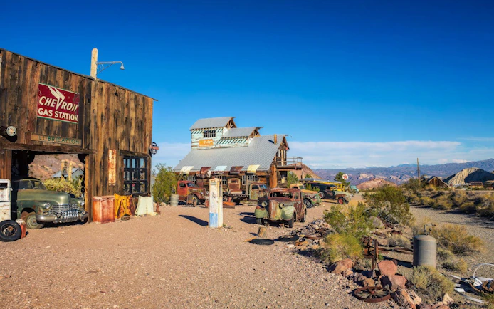 El Dorado Canyon Ghost Town with vintage cars and rustic buildings near Las Vegas.