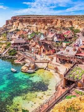Popeye Village colorful wooden houses by the sea in Malta.