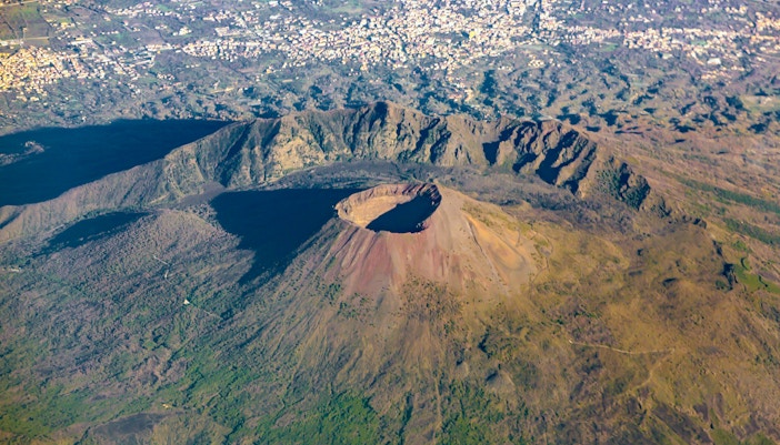 Aerial view of Mount Vesuvius, Italy, showcasing the crater and surrounding landscape.