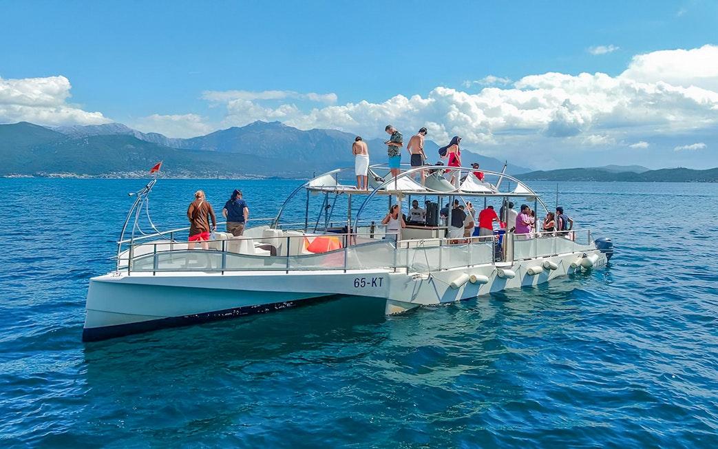 Guests enjoying the Blue Cave & Our Lady of The Rock boat tour.