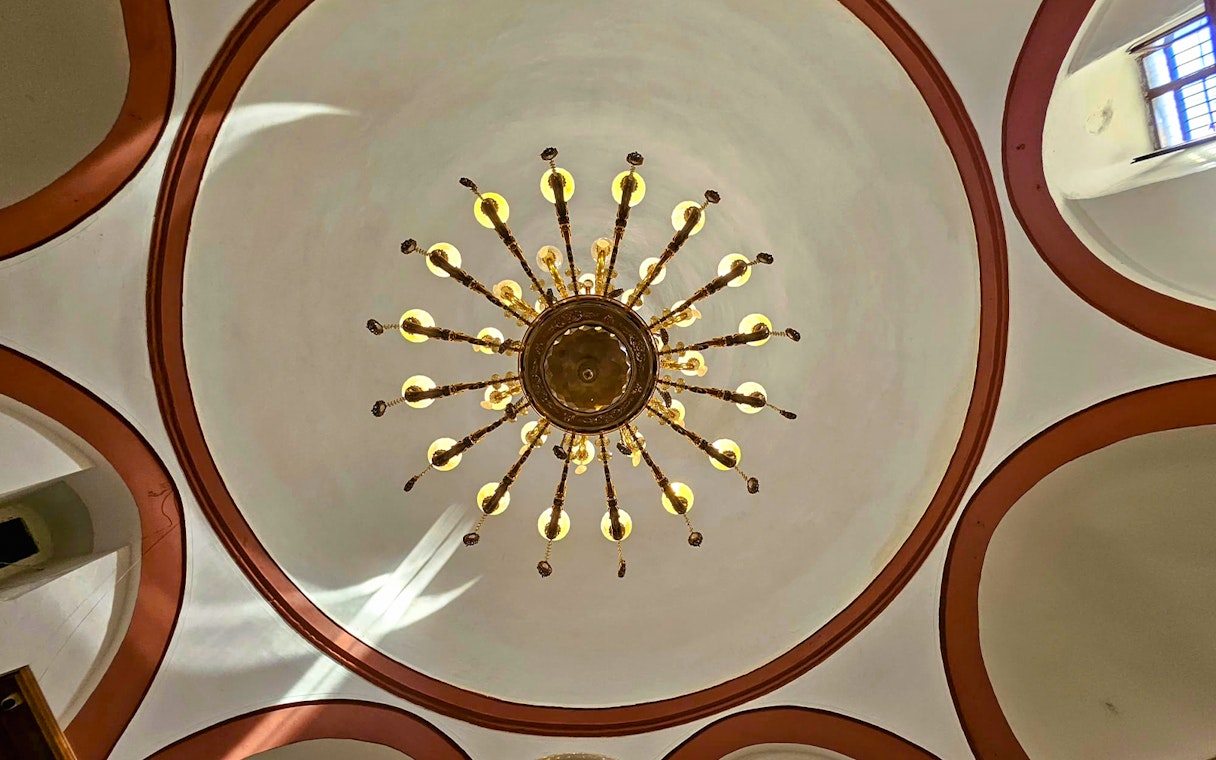 Chandelier and dome ceiling inside Gedikpasa Historical Hammam.
