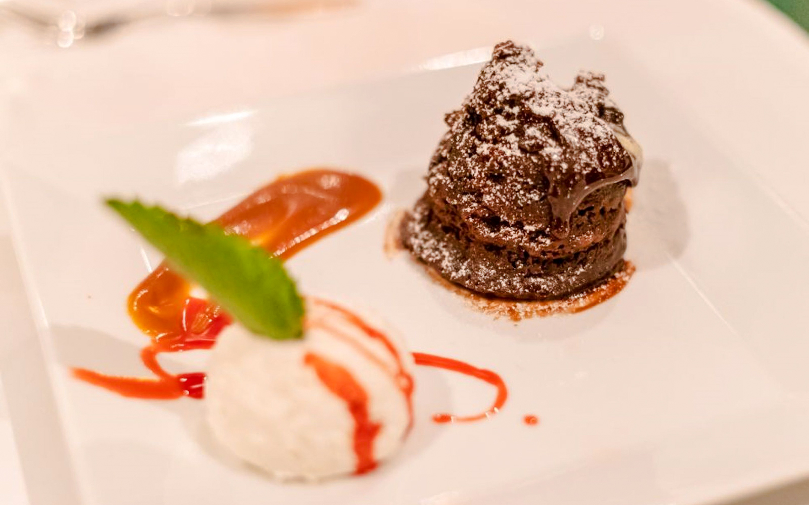 Chocolate dessert with sauce on Budapest Danube River Candlelit Dinner Cruise.