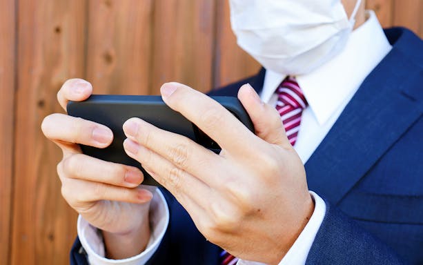 Person using smartphone with Japan 4G Tourist eSIM.