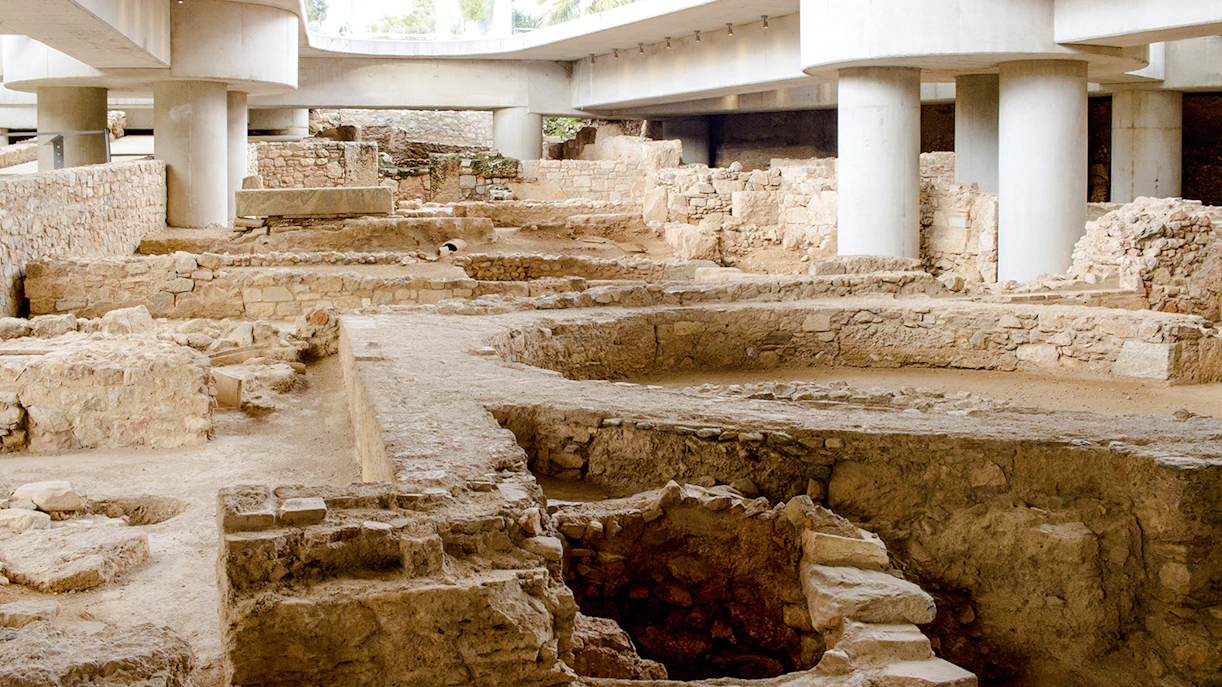 Excavation site beneath the New Acropolis Museum in Athens, Greece, showcasing ancient ruins.