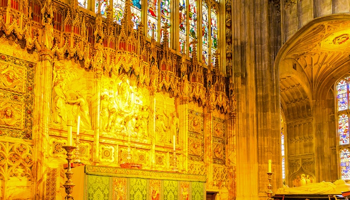 St George's Chapel altar with intricate carvings and stained glass windows, Windsor, England.