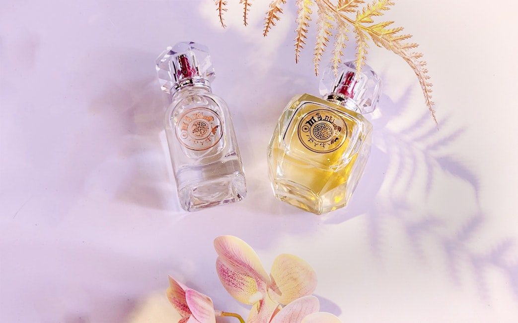 Perfume bottles with floral decor at Scentopia Sentosa Singapore.