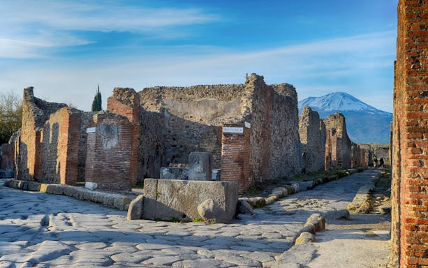 Ancient ruins of Pompeii with Mount Vesuvius in the background, Italy.