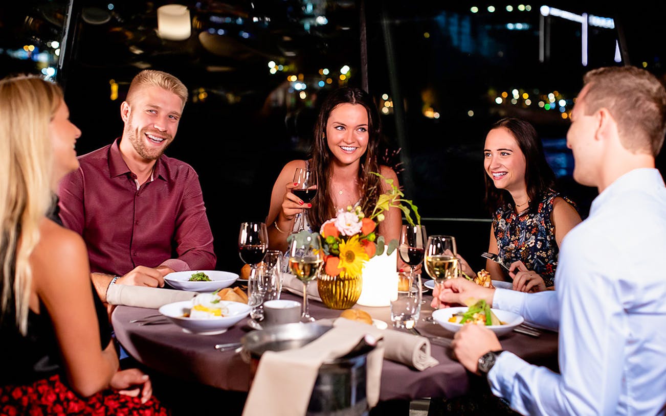 Guests dining aboard Bateaux Parisiens on New Year's Eve in Paris, 2025.