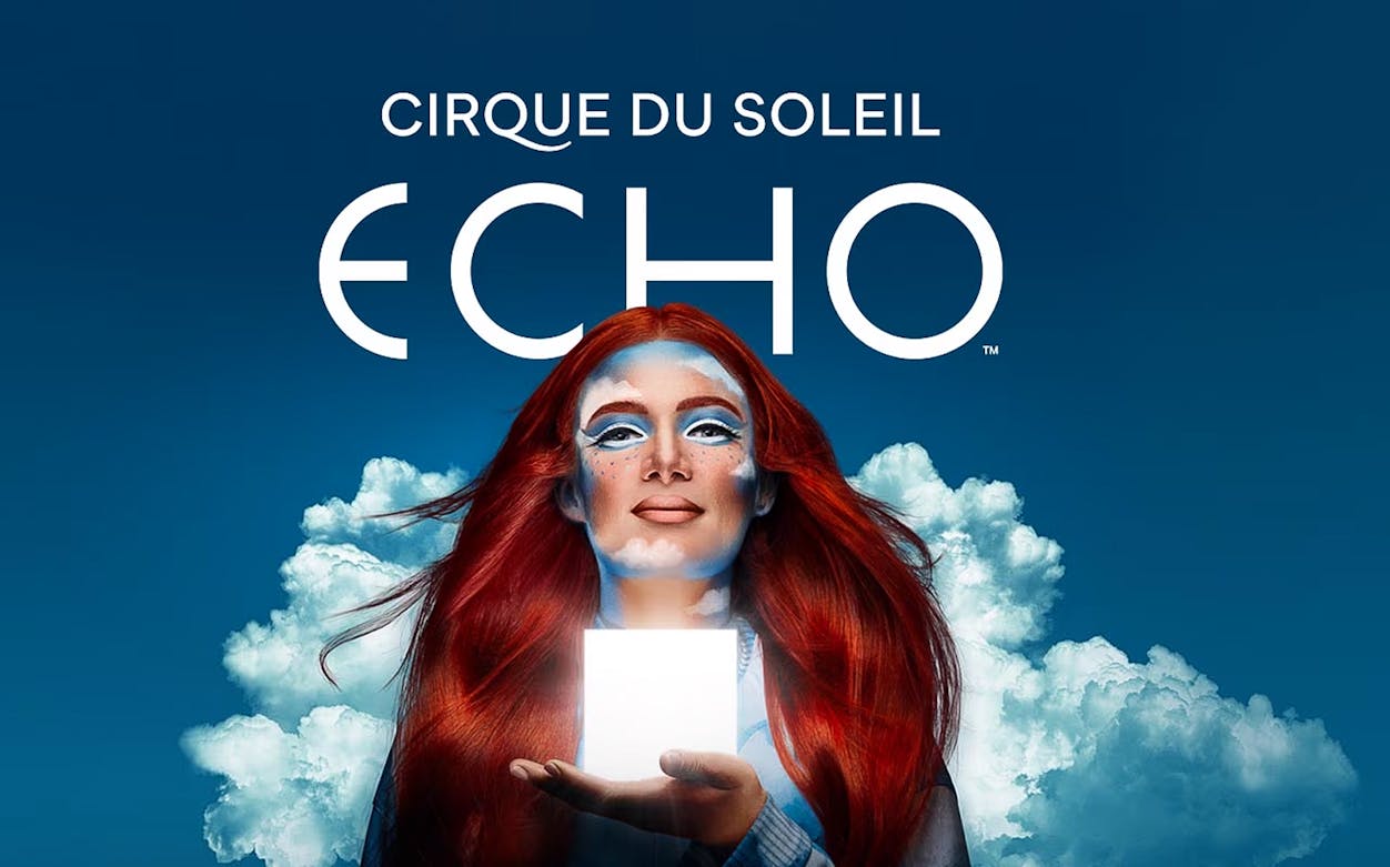 Performer with red hair holding a glowing cube, Cirque Du Soleil ECHO.
