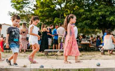 Children playing pétanque at Terre Ugo, Provence.
