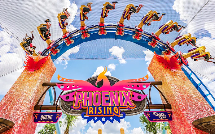 Phoenix Rising ride at Busch Gardens with riders upside down on a loop.