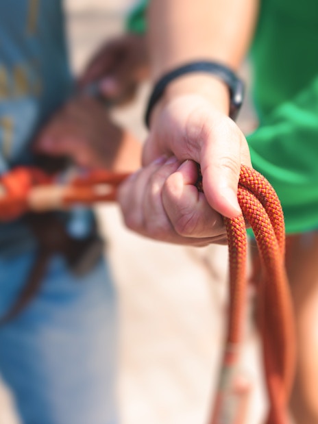 Person holding zipline harness rope at Fly LINQ Zipline, Las Vegas.