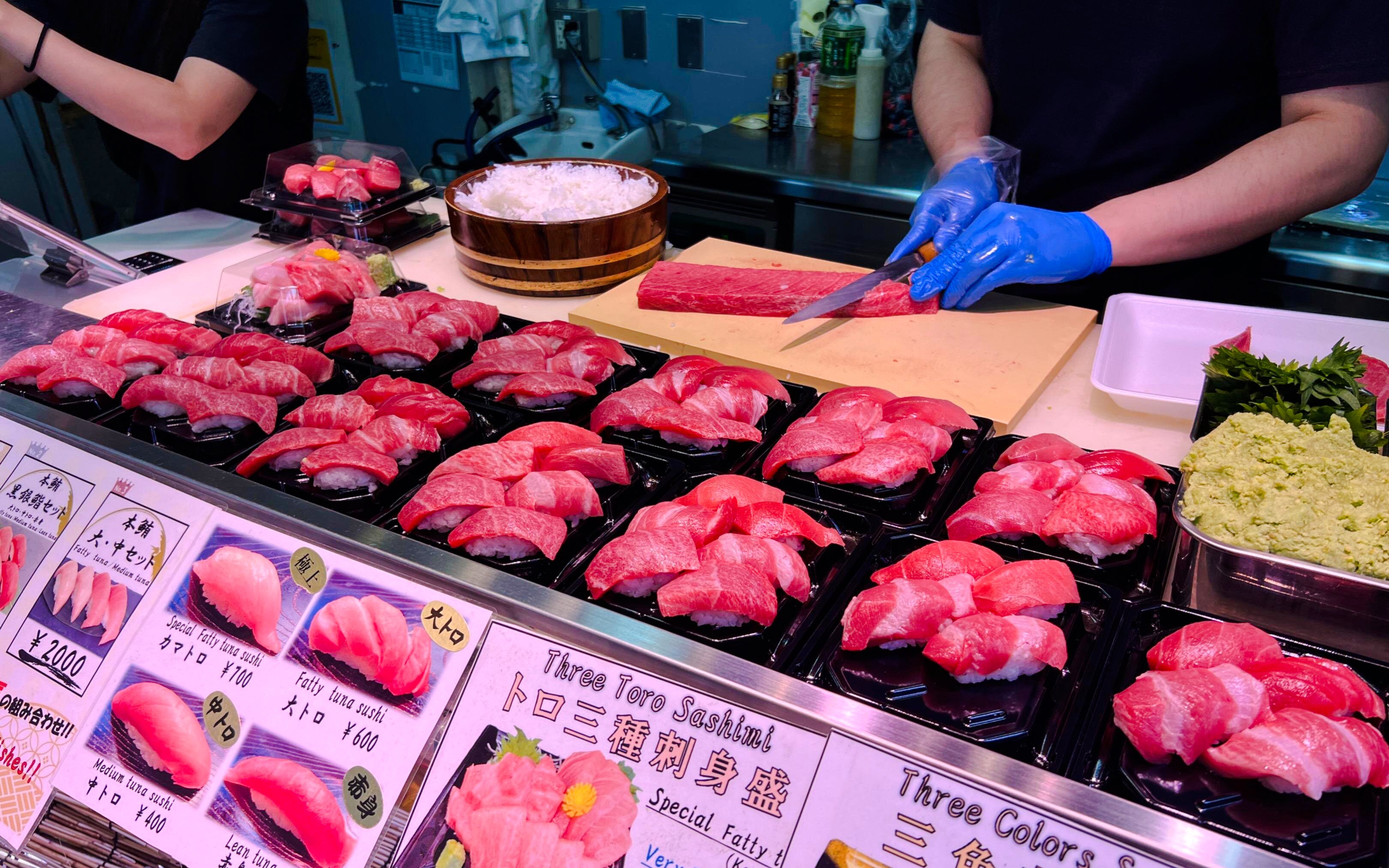 Sashimi stall with assorted tuna sushi at Tsukiji Fish Market, Tokyo.