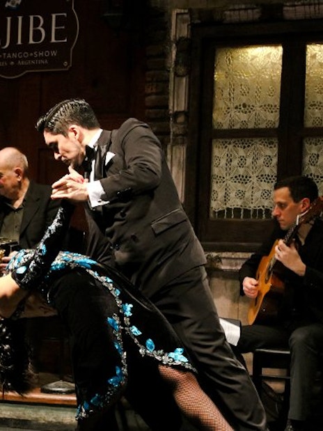 Tango dancers performing at Aljibe Tango Show in Buenos Aires, Argentina.