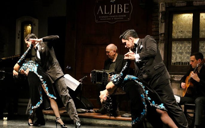 Tango dancers performing at Aljibe Tango Show in Buenos Aires, Argentina.