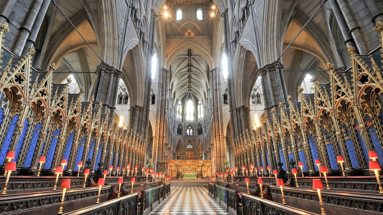 Westminster Abbey interior with ornate arches and choir stalls.