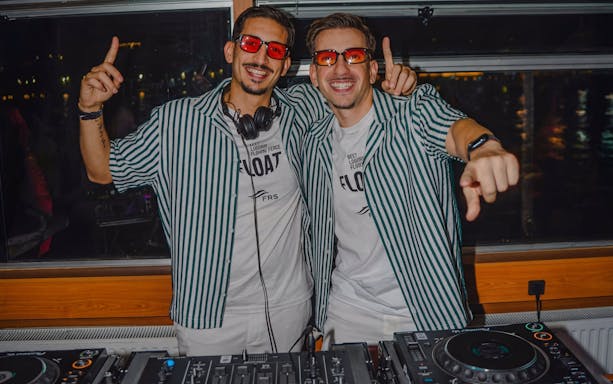 DJ performing on Lisbon Sunset Party Cruise with open bar.