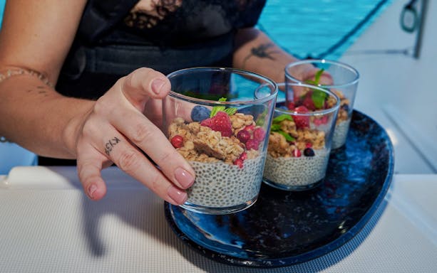 Chia pudding with berries served on Morning Luxury Catamaran Cruise from Ierapetra to Chrissi Island.