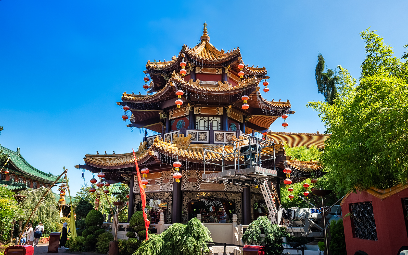 China Pagode in Phantasialand's China Town with traditional architecture and vibrant red lanterns.