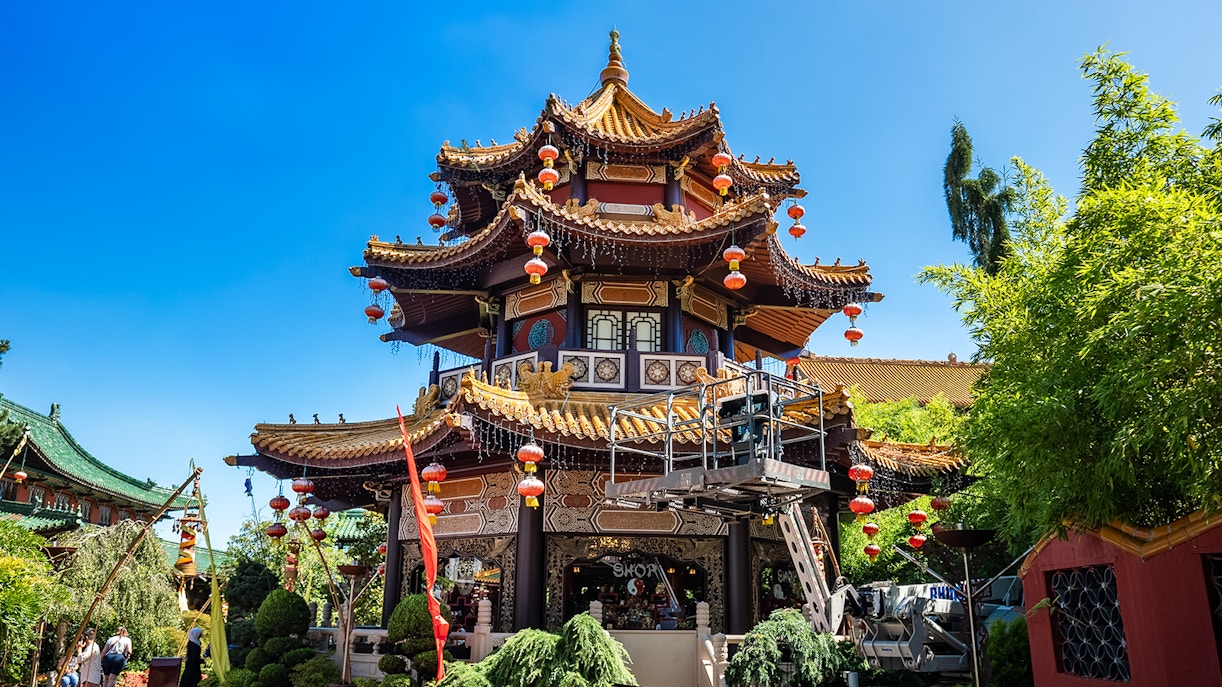 China Pagode in Phantasialand's China Town with traditional architecture and vibrant red lanterns.