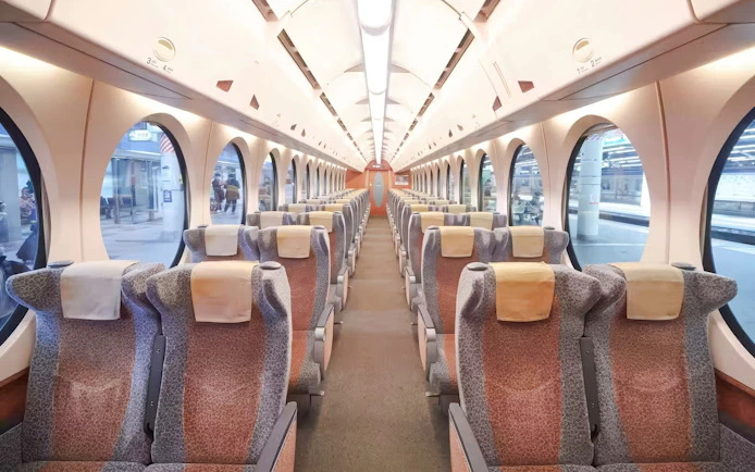 Interior of Nankai Limited Express train with rows of seats, Kansai Airport to Namba Station.