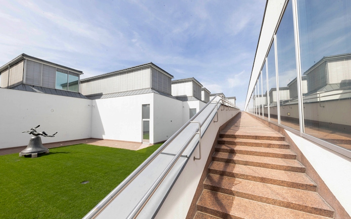 Rooftop sculpture and modern architecture at ALBERTINA KLOSTERNEUBURG.