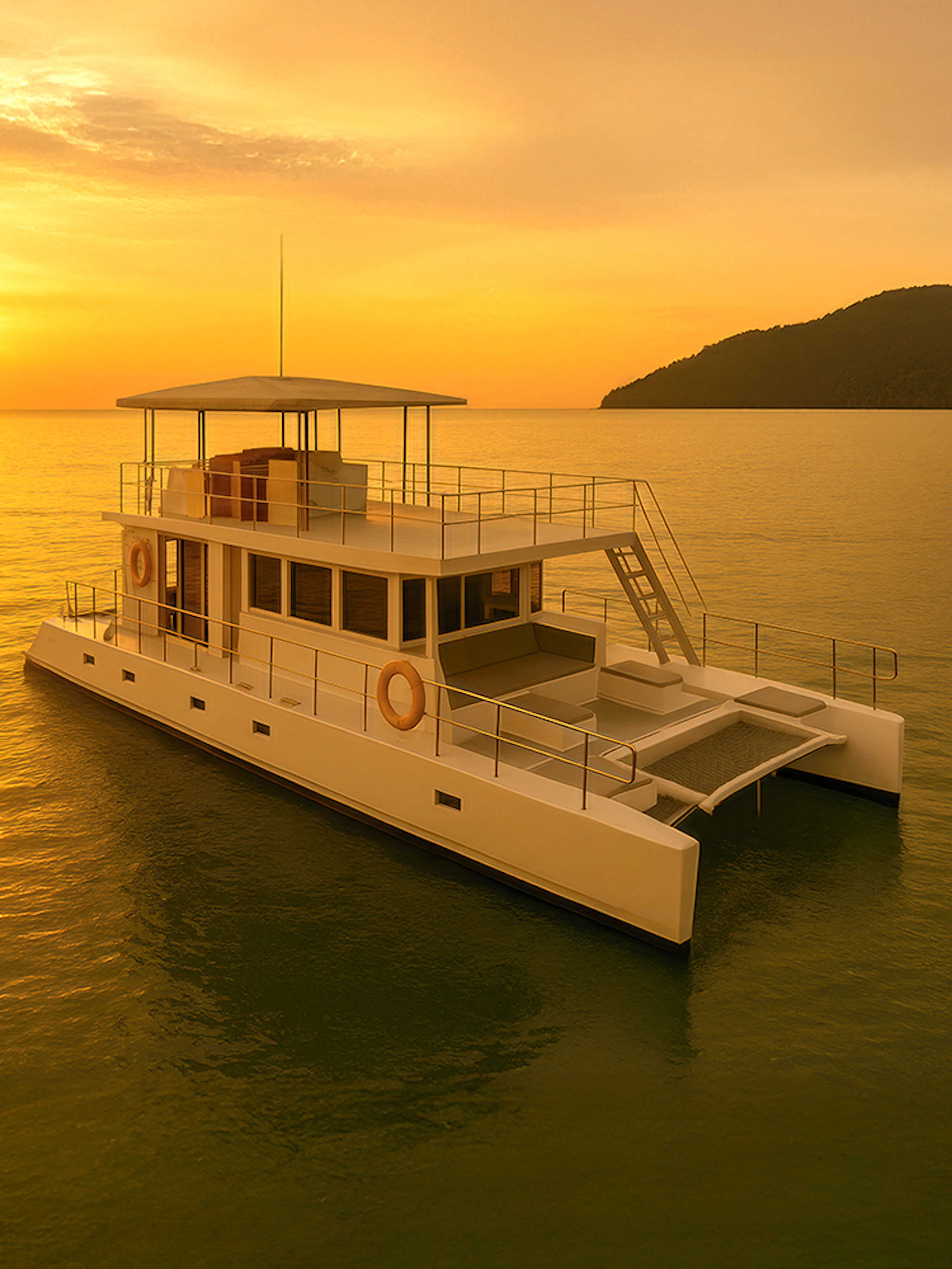 Catamaran sailing during Langkawi sunset cruise with islands in the background.