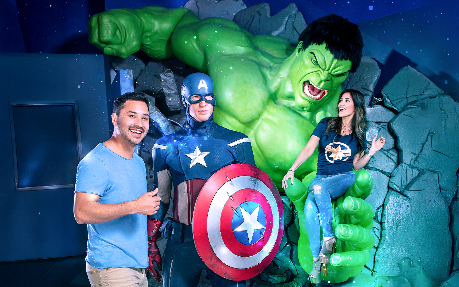 Captain America and Hulk wax figures at Madame Tussauds, New York with visitors.