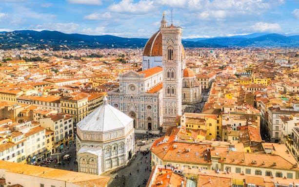 Florence Cathedral and Baptistery aerial view, showcasing iconic architecture in Florence, Italy.