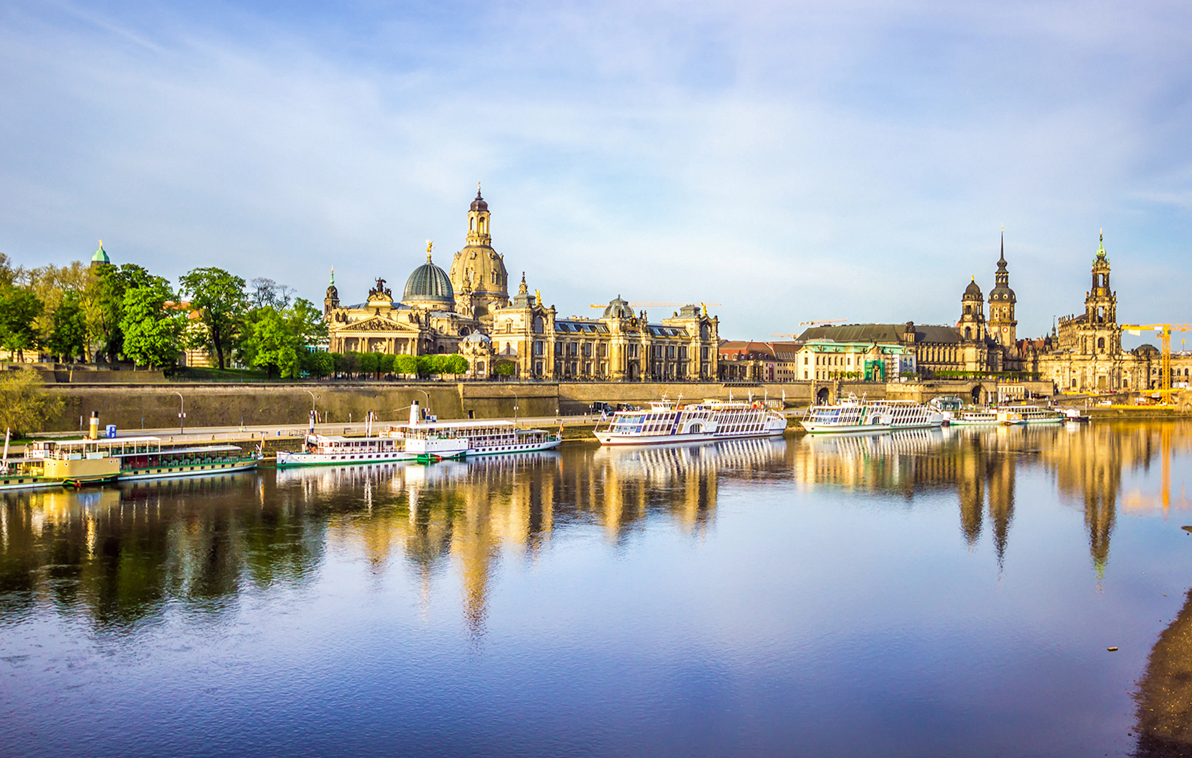 Dresden skyline with historic buildings along the Elbe River during a sightseeing cruise.
