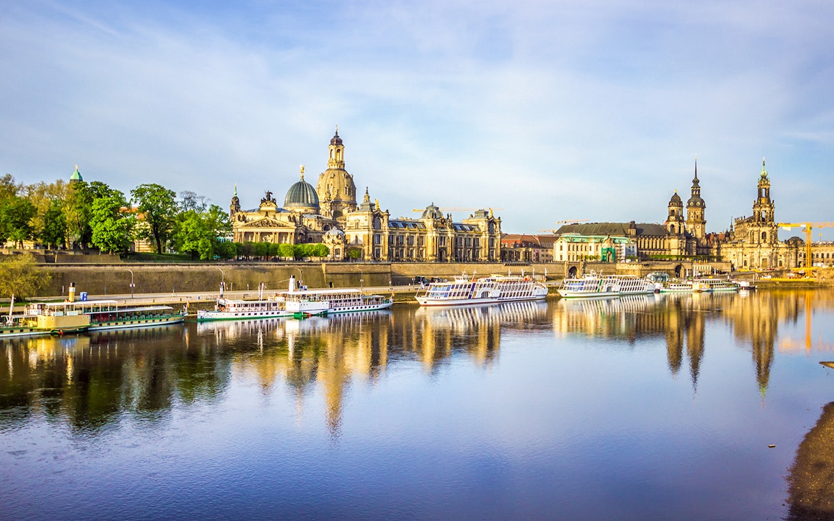 Dresden skyline with historic buildings along the Elbe River during a sightseeing cruise.