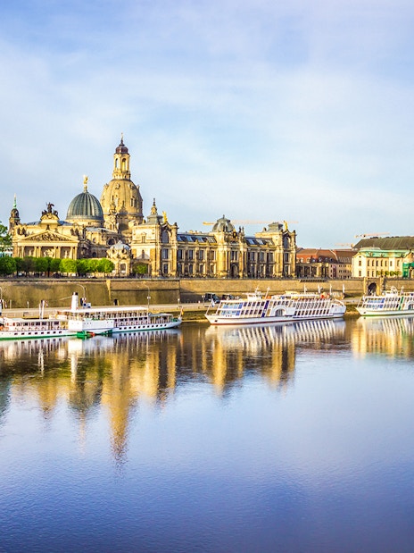 Dresden skyline with historic buildings along the Elbe River during a sightseeing cruise.