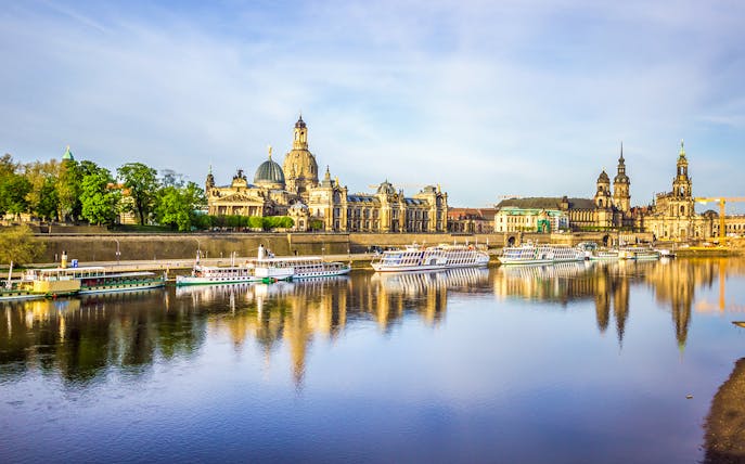 Dresden skyline with historic buildings along the Elbe River during a sightseeing cruise.